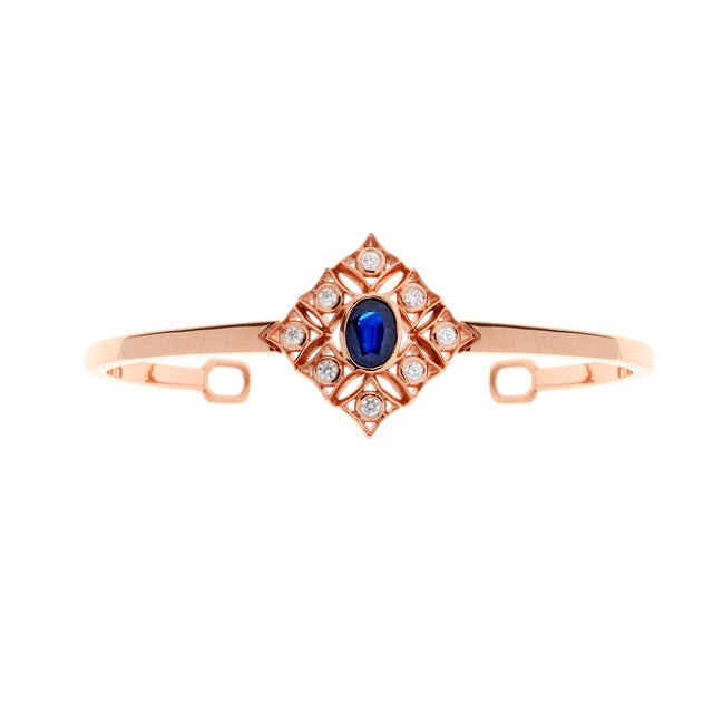 Oval sapphire and diamond 18ct rose gold bangle. Part of the Rinascimento Notta Rosa collection. 