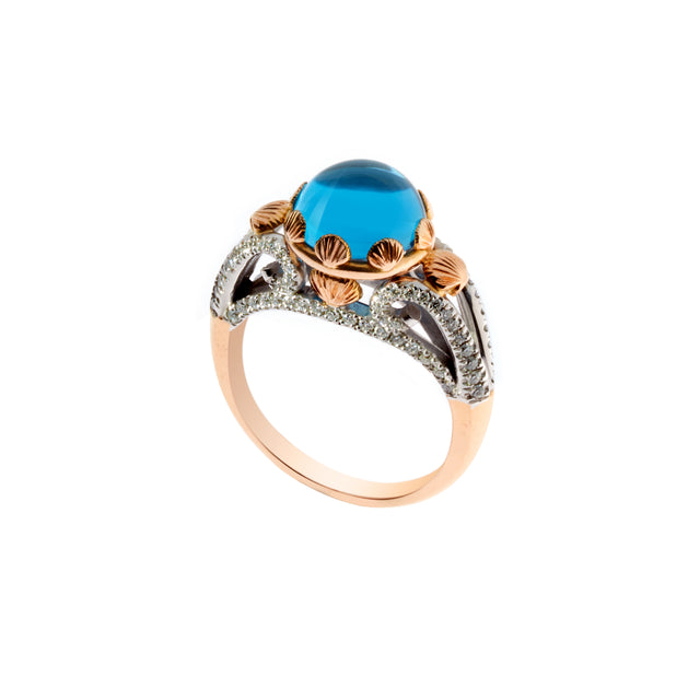 Blue topaz cabochon set in 18ct white & rose gold with round brilliant diamonds. Designed by Biagio Patalano.