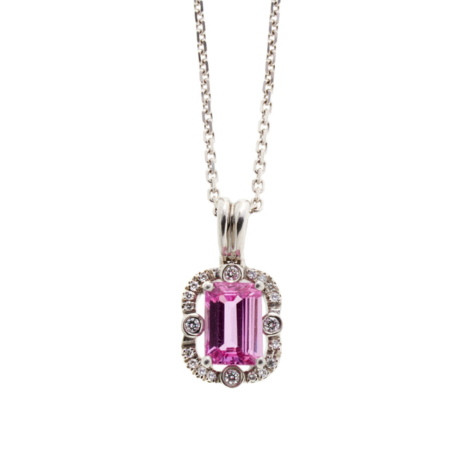 Emerald cut octagon pink sapphire necklace surrounded by round cut brilliant diamonds. Part of the Ballerina collection. 