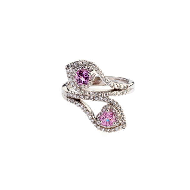 A pair of ruby hearts set in white gold, surrounded by round brilliant diamonds. Designed by Biagio Patalano. 