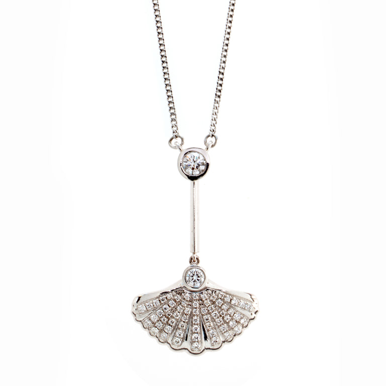 White gold and diamond shell pendant necklace with chain attached. Part of the Sirena collection. 