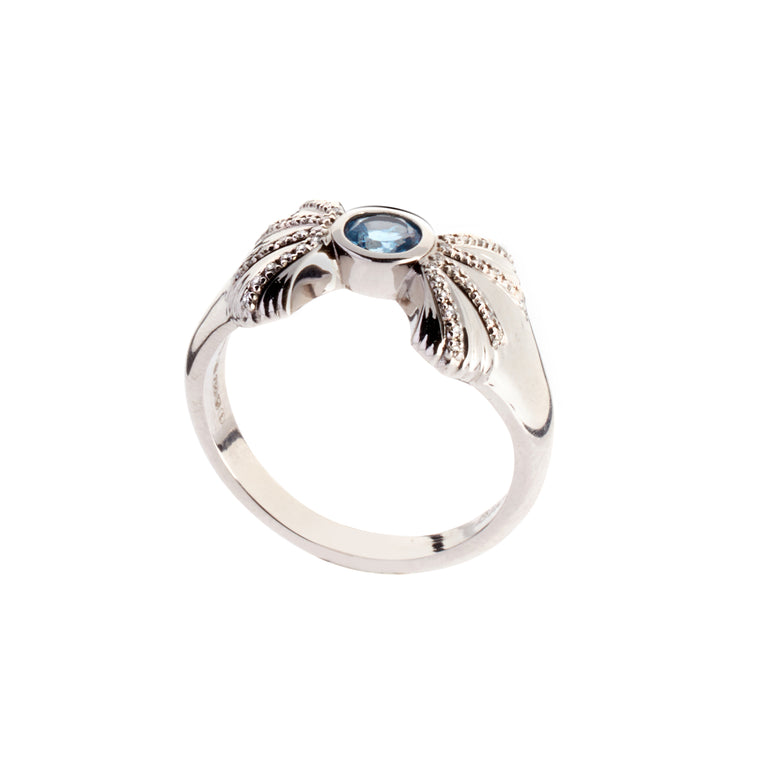 Double shell ring with aquamarine central stone and diamonds. Part of the Sirena collection by Biagio Patalano.  