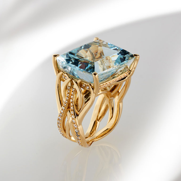 cushion cut topaz set in 18ct yellow gold with round brilliant cut diamonds designed by Biagio Patalano 